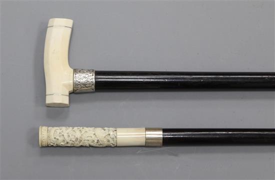 An ebonised cane, 32.5in.
